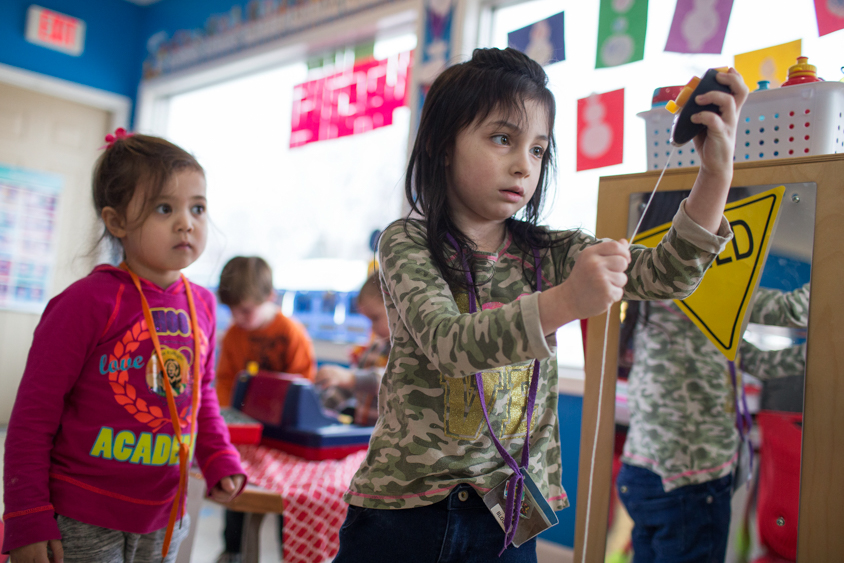 Izzy Green plays with toys at Lily Pad Learning Center in Madrid, Iowa on Thursday, January 19, 2017. KC McGinnis for Spectrum