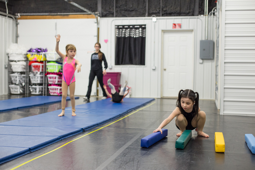 Izzy Green arranges foam blocks during a dance practice in Madrid, Iowa on Thursday, January 19, 2017. Green's instructor said she often becomes distracted by the last 10 minutes of dance practice. KC McGinnis for Spectrum