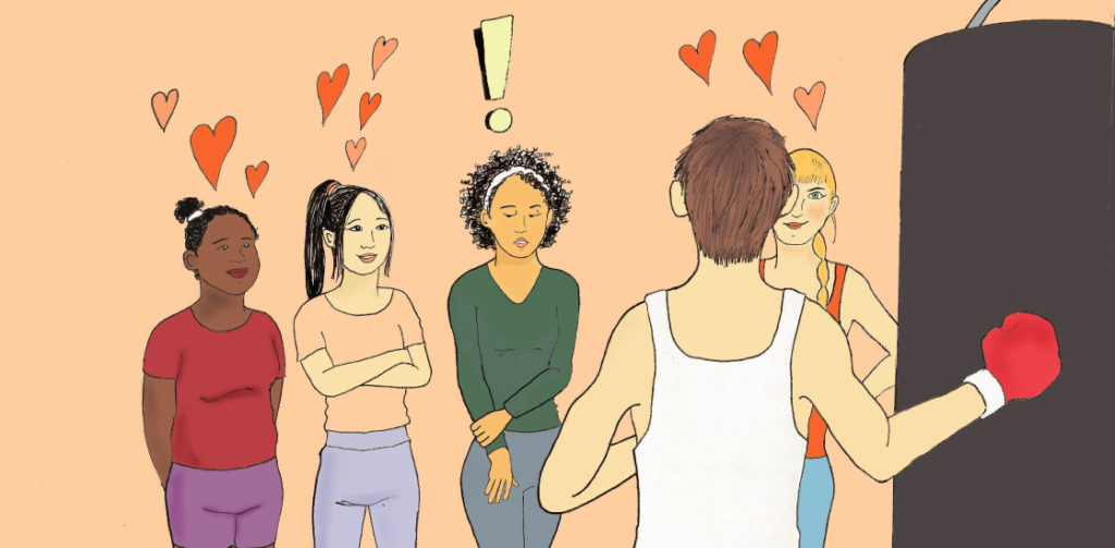women looking at handsome boxing instructor