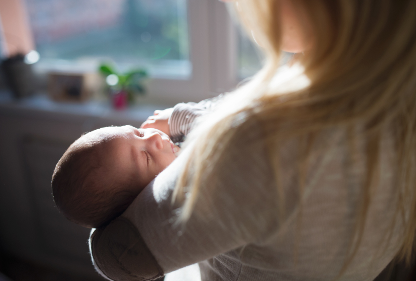 Newborn with mother