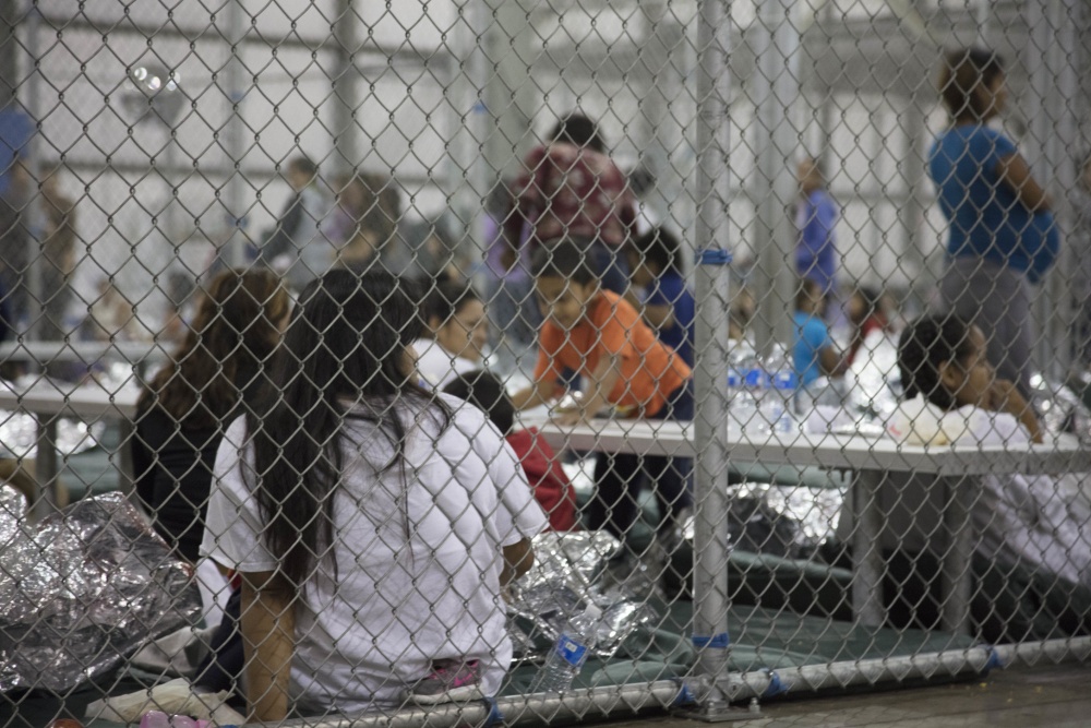Adults and children in metal cages at the Central Processing Center in McAllen, Texas, Sunday, June 17, 2018.