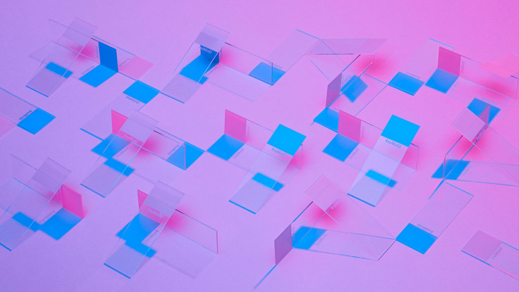 lab slides on pink background form a pattern.