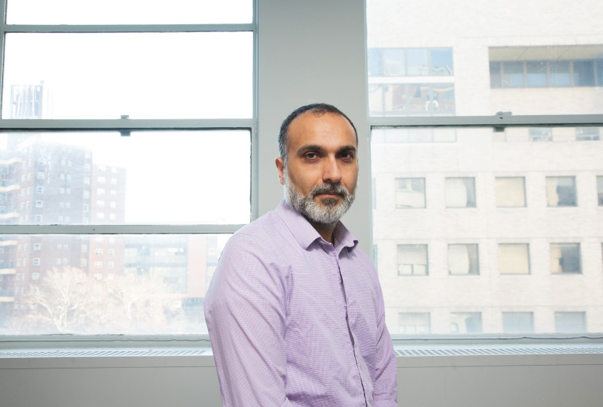 Photo: Manish Arora stands in front of windows.