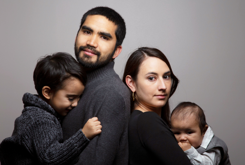 Photo: The Patao family. In the middle, standing back to back, are the parents. Melissa holds baby Zayden while her husband holds the older Shane.