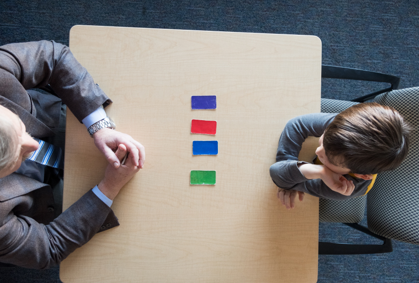 Boy during test with researcher