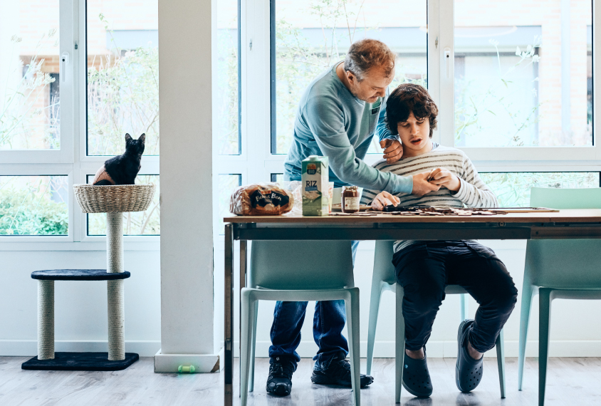 Gabin and his father at home in Paris.