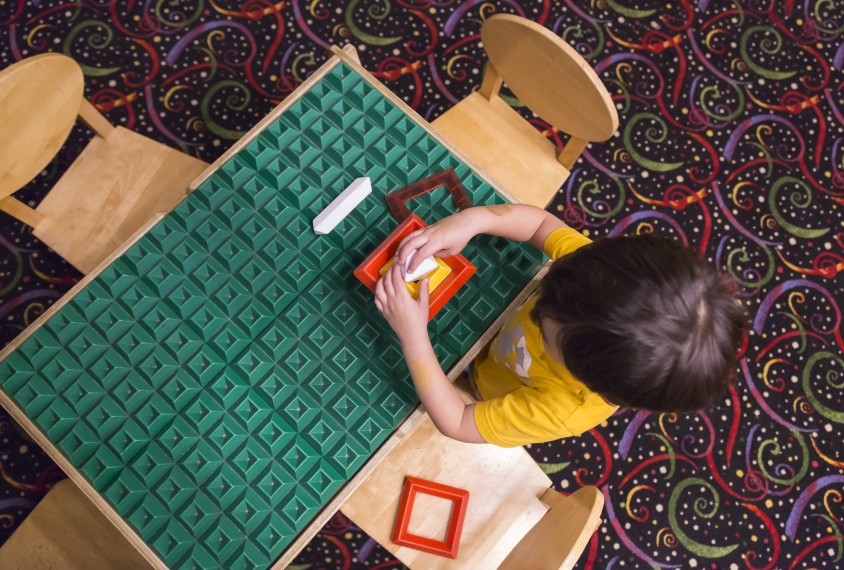 Child with educational toys