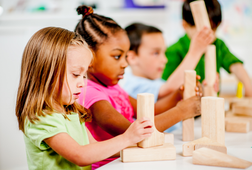 Children Playing with Toy Blocks