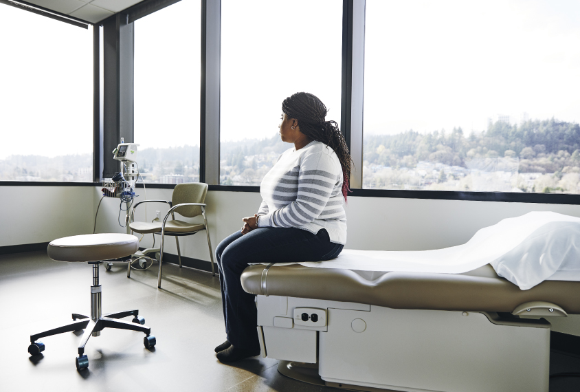 African american woman alone in medical setting