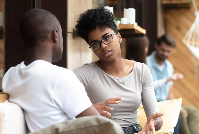 two young people in conversation