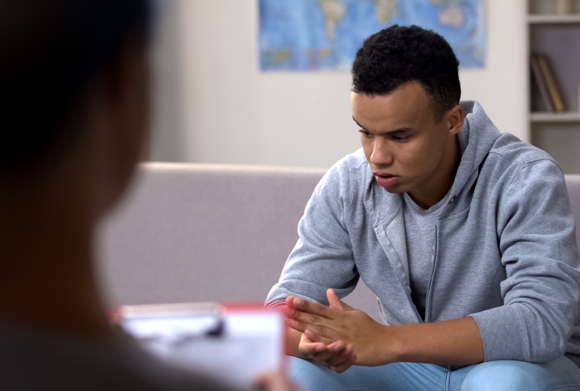Young black man in inpatient psychiatric care facility
