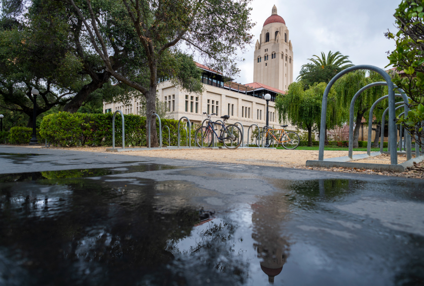 Scene showing empty bike racks on Stanford campus.