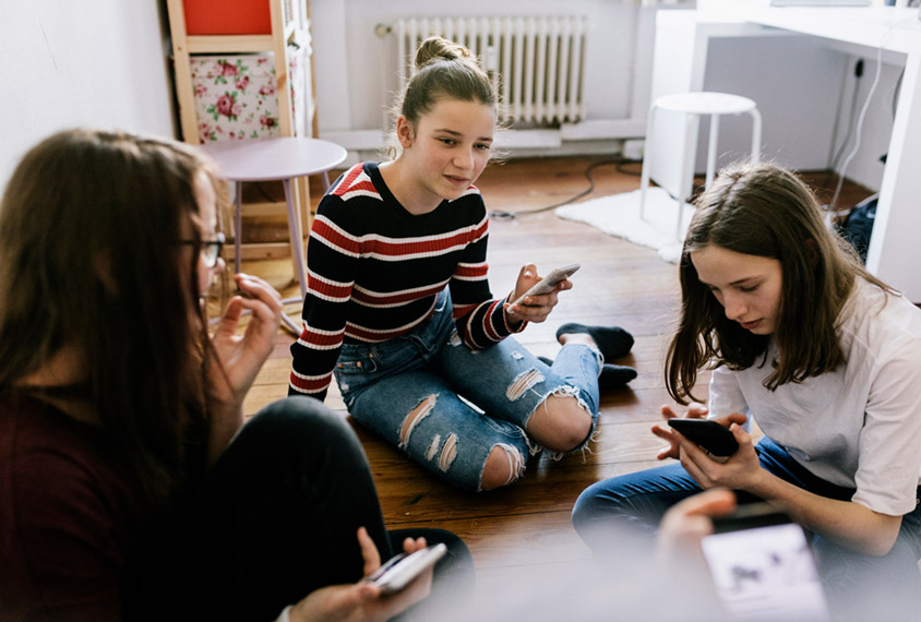 three teens chatting