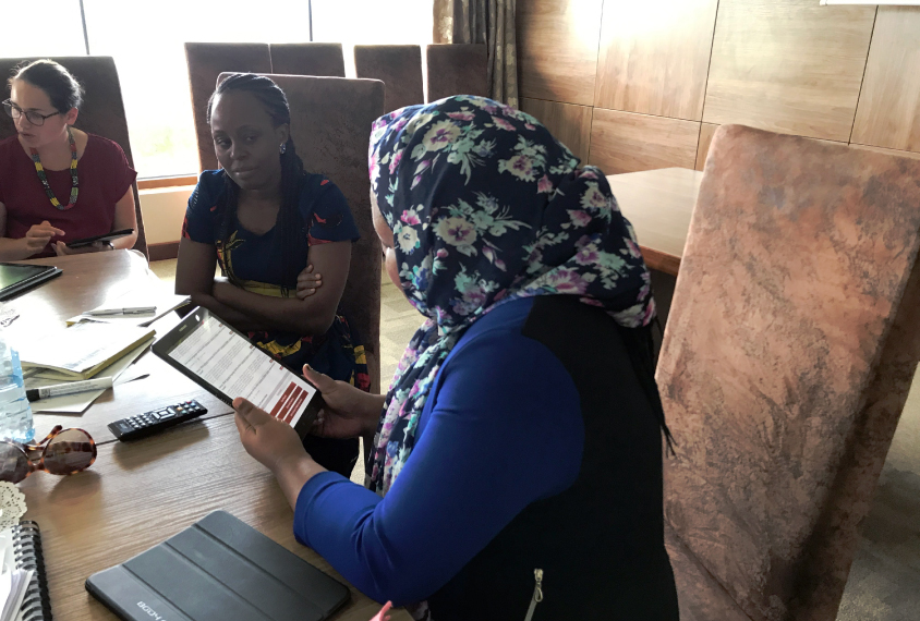 Amina Abubakar, Tumaini Mapenzi and Michelle Hoogenhot at a team meeting in Kilifi.