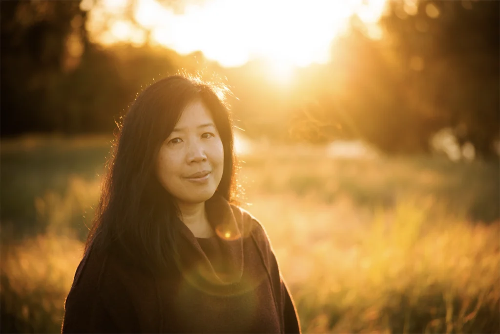 Sunlit portrait photograph of Christine Wu Nordahl.