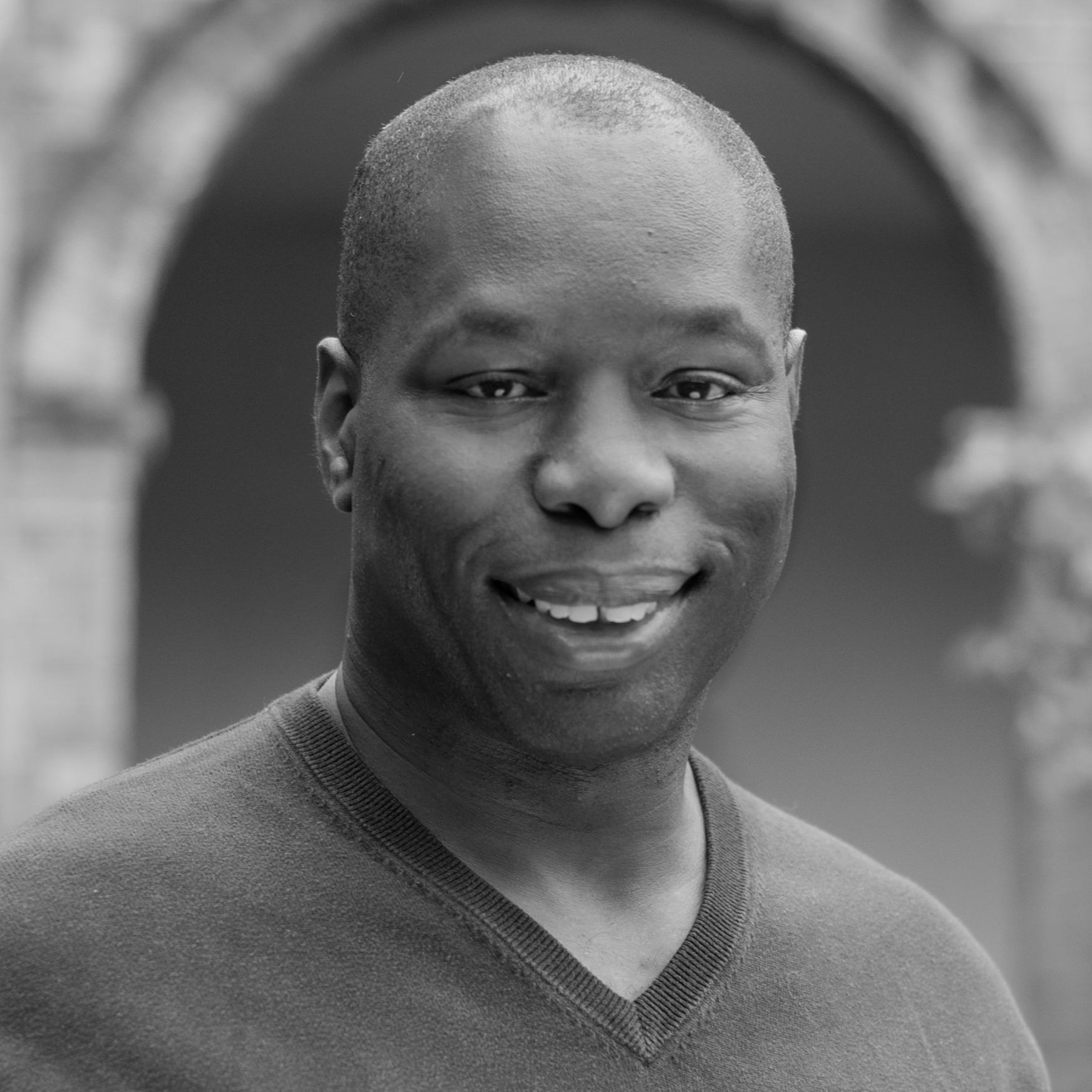 Headshot of Conrad Iyegbe.