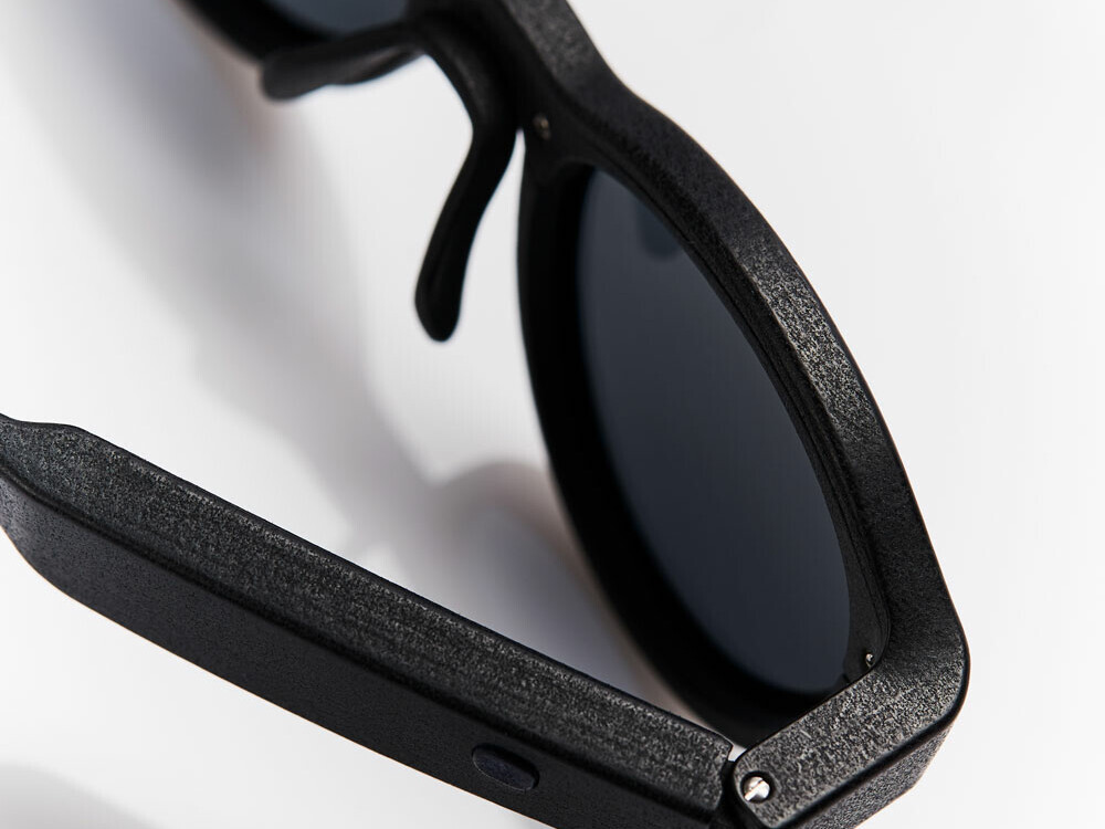 A photograph of black sunglasses