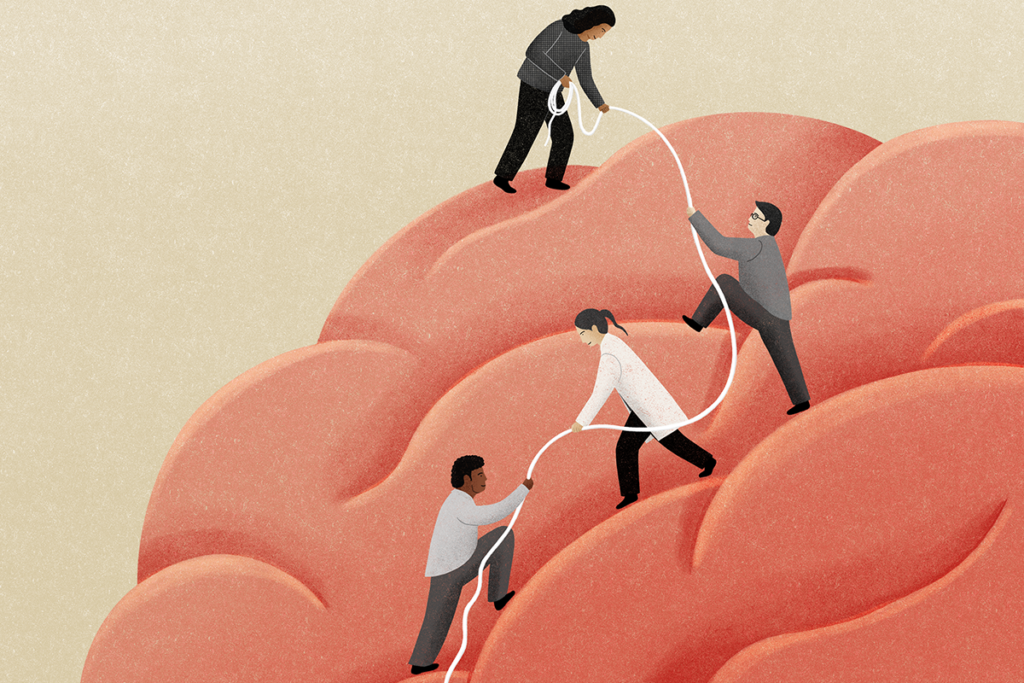 People help each other climb up a supersized human brain.