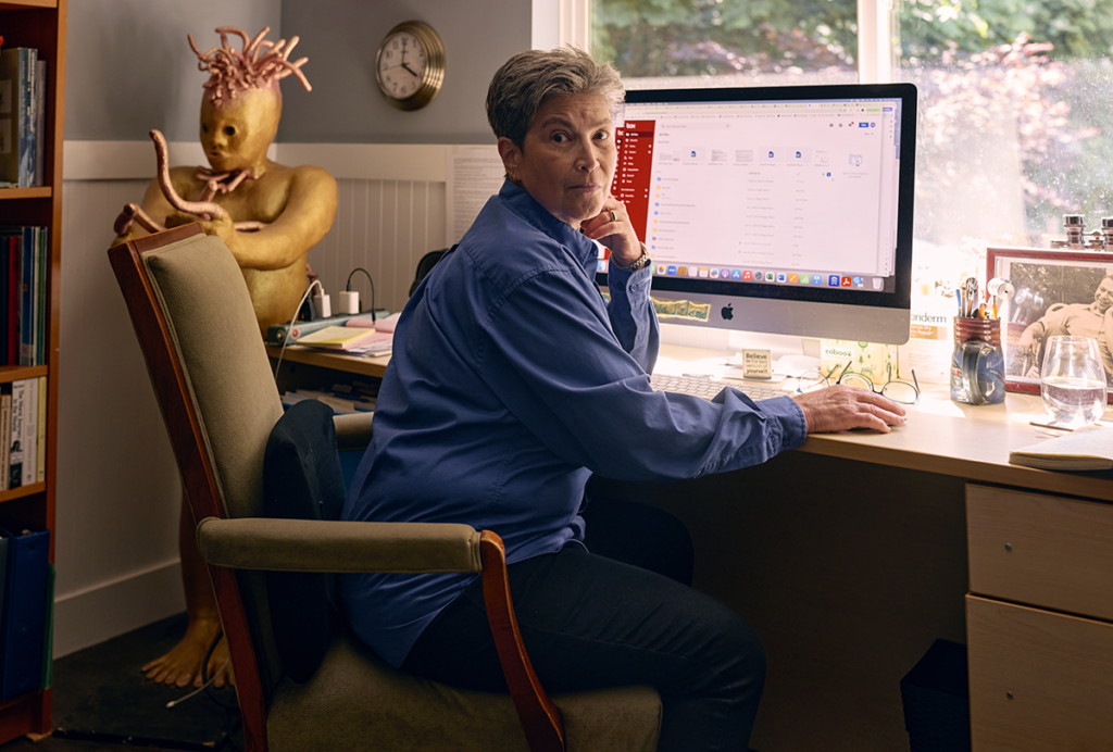 Peggy Mason at her desk.