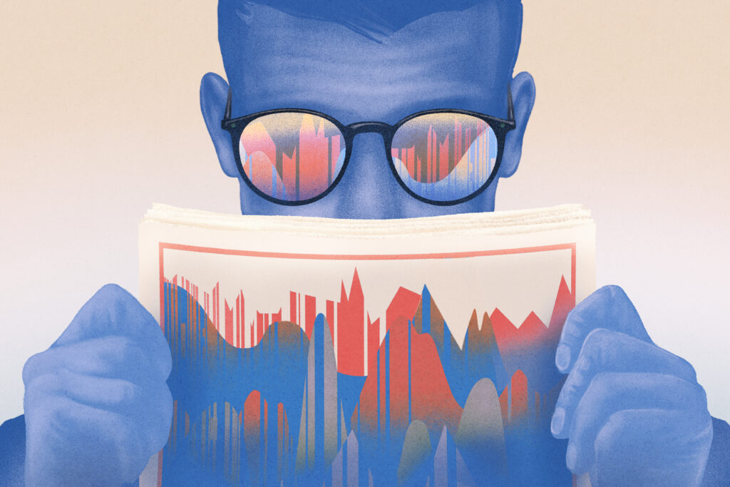 A man with glasses reads from a paper with a graph-like pattern of peaks and valleys on it.