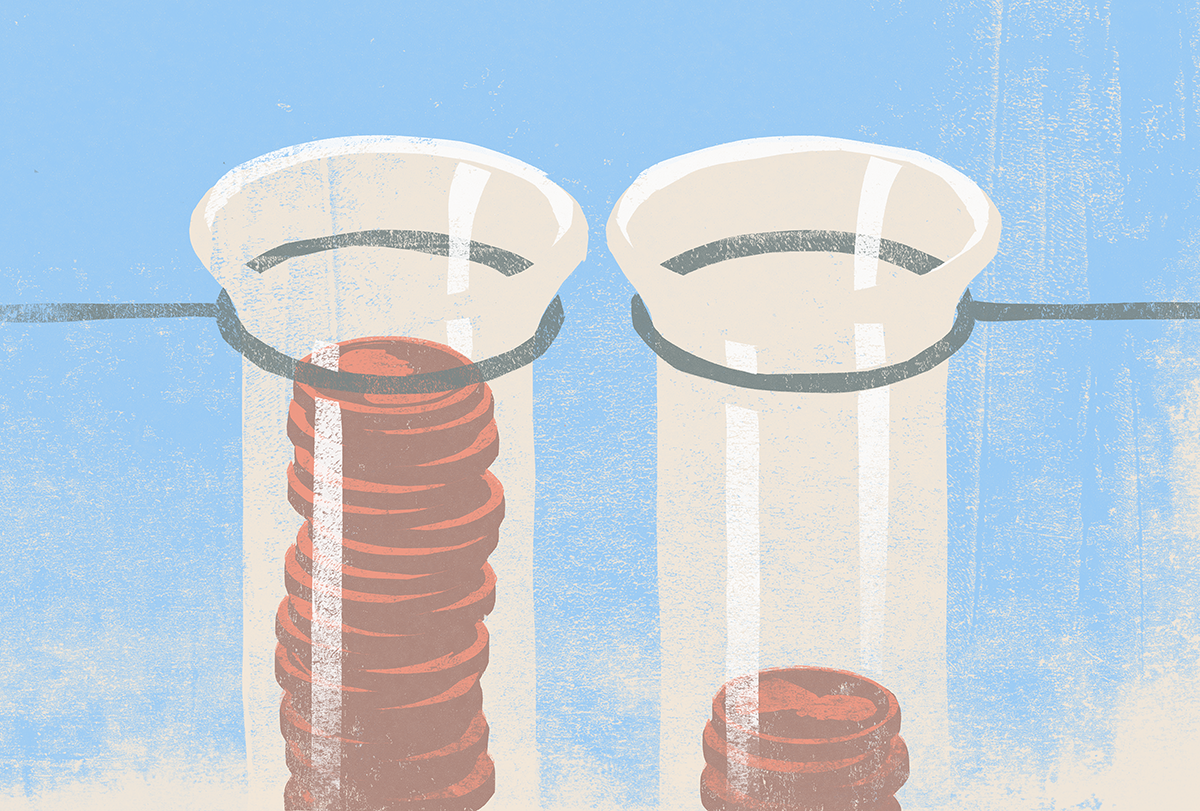 Two test tubes filled with coins.
