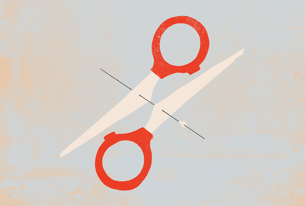 Deconstructed scissors in the shape of a percentage sign.