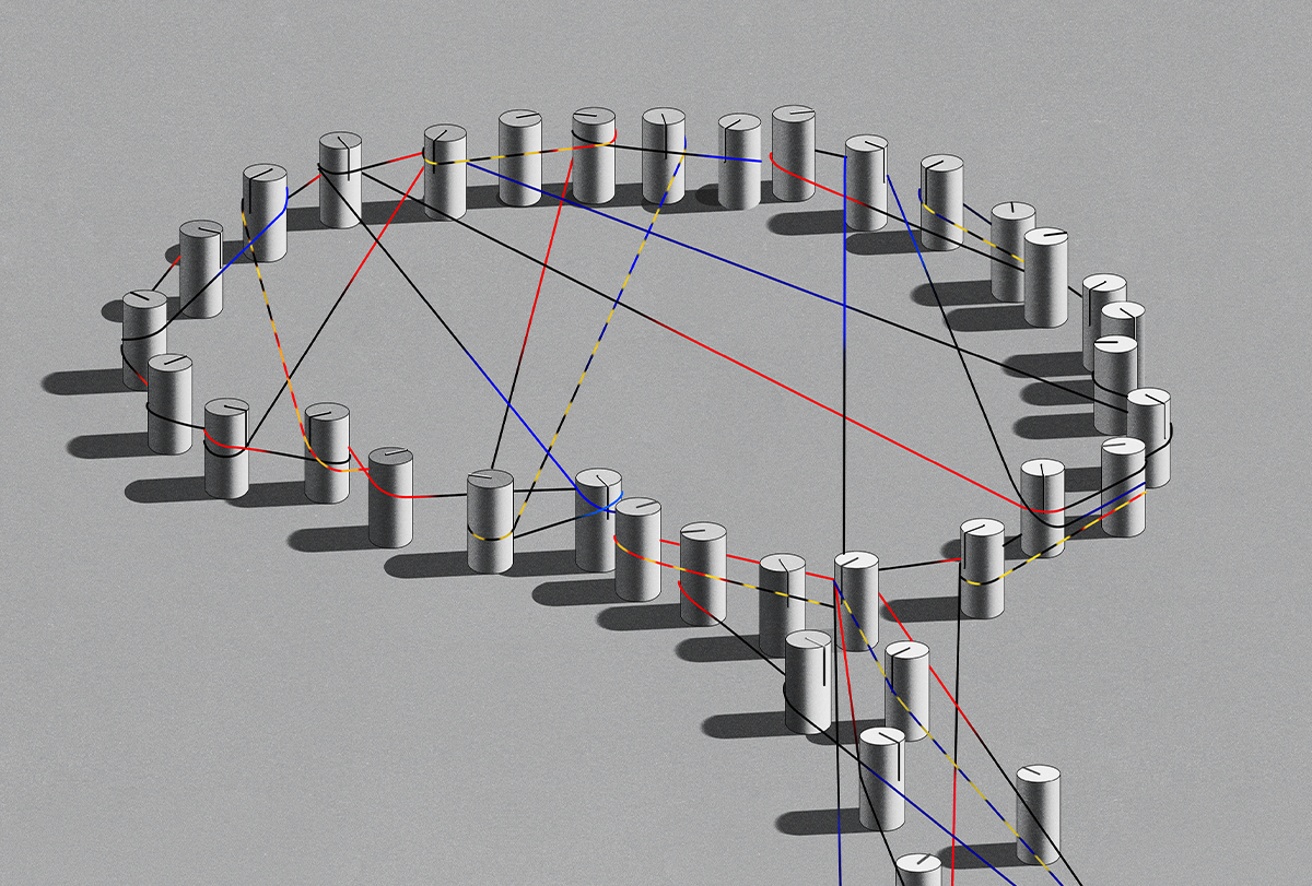 A brain shape outlined in cylindrical dials with multi colored wires stretched between them.