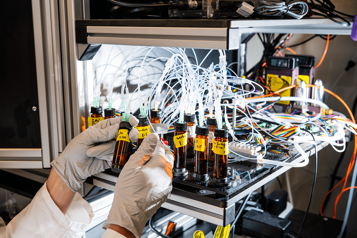 Lab detail showing multiple vials connected to small tubes.