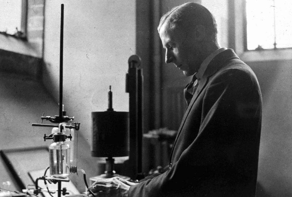 Edgar Adrian works in the laboratory, around 1920.